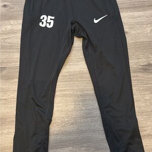 Nike Kids Black Athletic Soccer Pant with zipper.